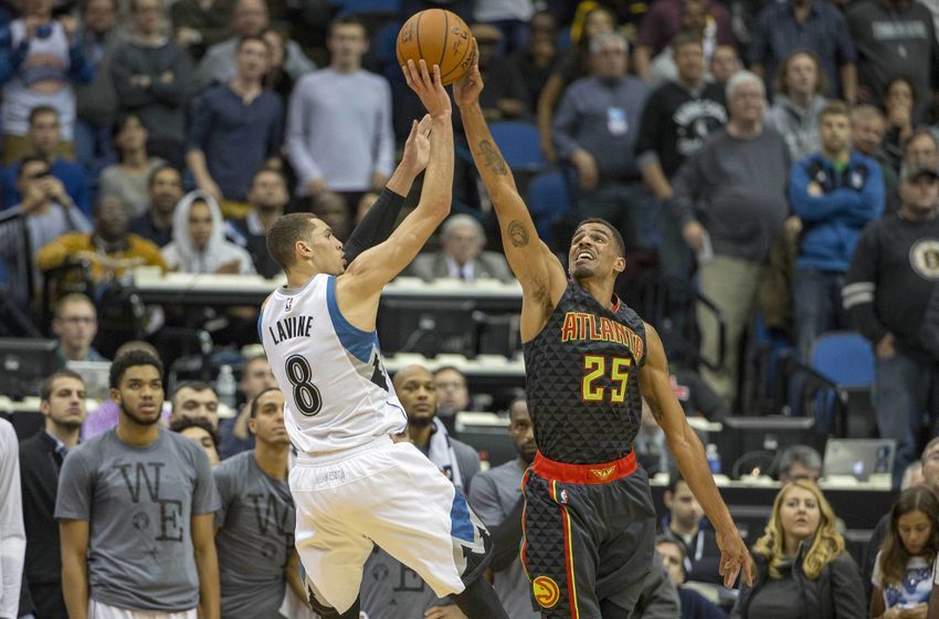 Nov 25, 2015; Minneapolis, MN, USA; Atlanta Hawks guard Thabo Sefolosha (25) blocks a shot from Minnesota Timberwolves guard <a rel=