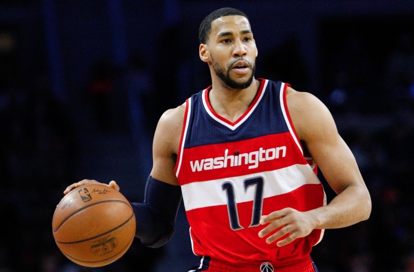 Apr 8, 2016; Auburn Hills, MI, USA; Washington Wizards guard Garrett Temple (17) dribbles the ball during the second quarter against the Detroit Pistons at The Palace of Auburn Hills. Pistons win 112-99. Mandatory Credit: Raj Mehta-USA TODAY Sports