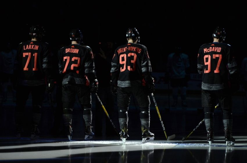 black and orange oilers jersey