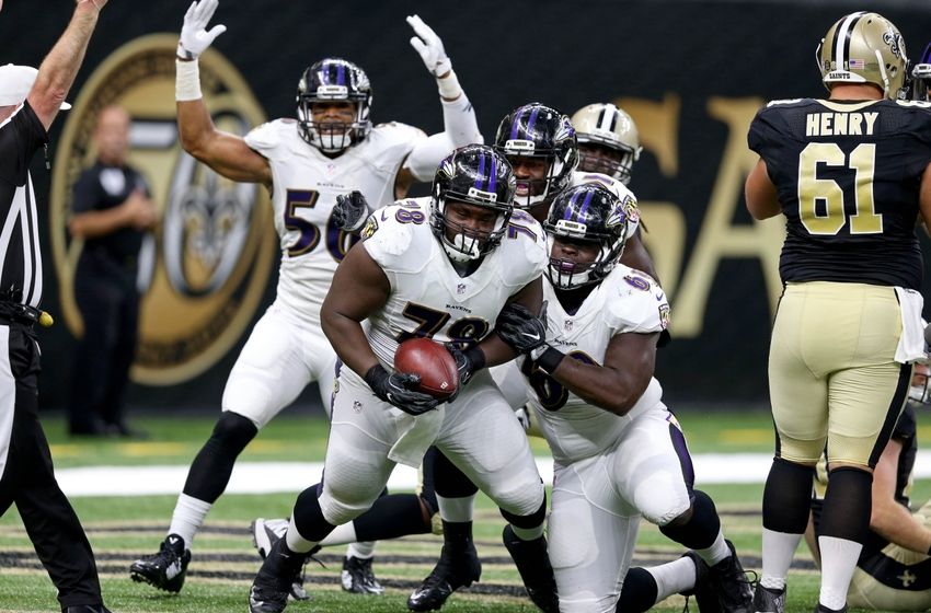 Sep 1, 2016; New Orleans, LA, USA; Baltimore Ravens defensive tackle Michael Pierce (78) celebrates his fumble recovery for a touchdown with teammates Chris Carter (56) and Willie Henry (69) during the second quarter of their game against the New Orleans Saints at the Mercedes-Benz Superdome. Mandatory Credit: Chuck Cook-USA TODAY Sports