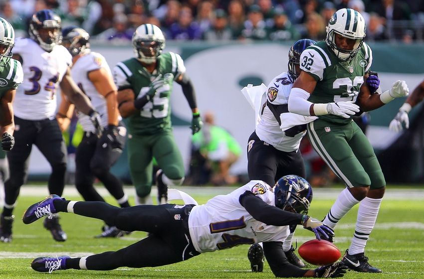 Oct 23, 2016; East Rutherford, NJ, USA; Baltimore Ravens wide receiver Devin Hester (14) recovers his own fumble during the second half at MetLife Stadium. The Jets defeated the Ravens 24-16. Mandatory Credit: Ed Mulholland-USA TODAY Sports