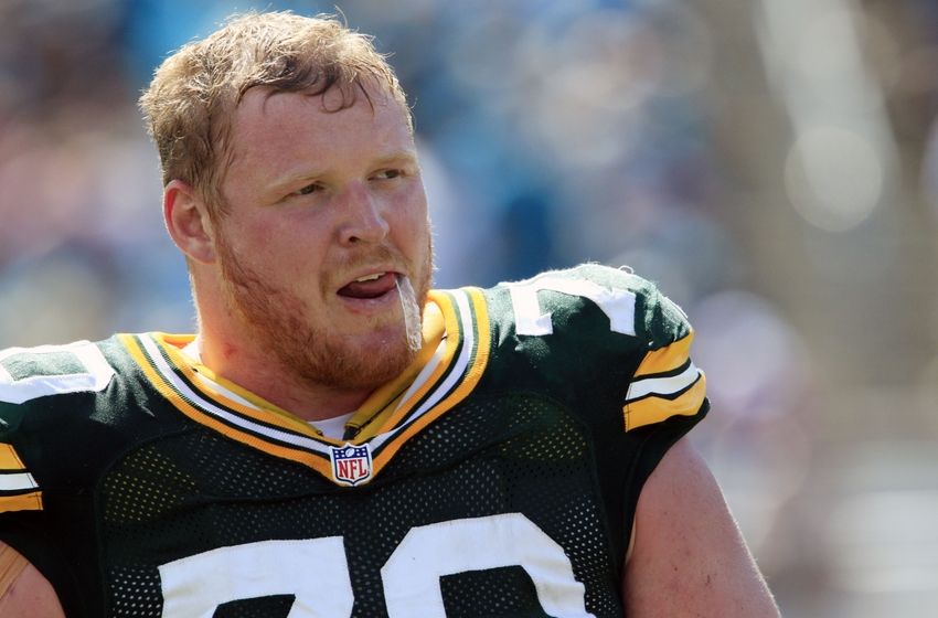 Sep 11, 2016; Jacksonville, FL, USA; Green Bay Packers guard T.J. Lang (70) watches from the sidelines during the second half of a football game against the Jacksonville Jaguars at EverBank Field.The Green Bay Packers won 27-23. Mandatory Credit: Reinhold Matay-USA TODAY Sports