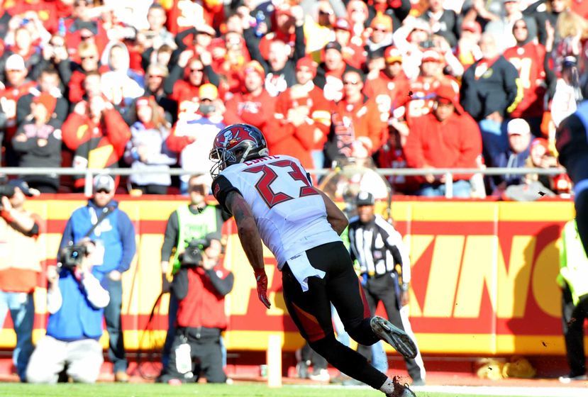 Nov 20, 2016; Kansas City, MO, USA; Tampa Bay Buccaneers strong safety Chris Conte (23) intercepts a pass and runs the ball during the second half against the Kansas City Chiefs at Arrowhead Stadium. Tampa Bay won 19-17. Mandatory Credit: Denny Medley-USA TODAY Sports