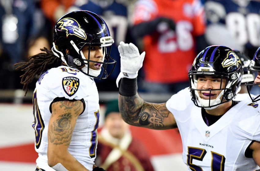 Dec 12, 2016; Foxborough, MA, USA; Baltimore Ravens wide receiver Chris Moore (10) and inside linebacker Kamalei Correa (51) celebrate after recovering the ball after a punt during the second half against the New England Patriots at Gillette Stadium. Mandatory Credit: Brian Fluharty-USA TODAY Sports 