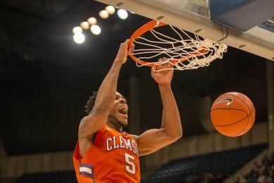 Dec 18, 2016; Birmingham, AL, USA; Clemson Tigers forward Jaron Blossomgame (5) dunks the ball during the game against Alabama Crimson Tide at Legacy Arena. Mandatory Credit: Marvin Gentry-USA TODAY Sports