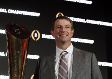 Jan 10, 2017; Tampa, FL, USA; Clemson Tigers head coach Dabo Swinney poses with national championship trophy during a news conference at Tampa Convention Center. Mandatory Credit: Kim Klement-USA TODAY Sports