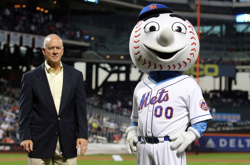 Sep 26, 2014; New York, NY, USA; New York Mets general manager Sandy Alderson on the field with mascot Mr. Met before a game against the Houston Astros at Citi Field. Mandatory Credit: Brad Penner-USA TODAY Sports