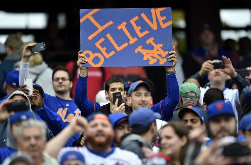 Oct 1, 2016; Philadelphia, PA, USA; Fans celebrate a victory after the New York Mets clinched a wild-card playoff berth after a game against the Philadelphia Phillies at Citizens Bank Park. The Mets won 5-3. Mandatory Credit: Derik Hamilton-USA TODAY Sports