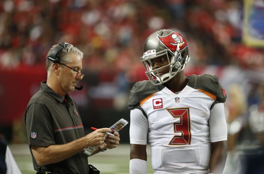 Sep 11, 2016; Atlanta, GA, USA; Tampa Bay Buccaneers head coach Dirk Koetter talks with quarterback <a rel=