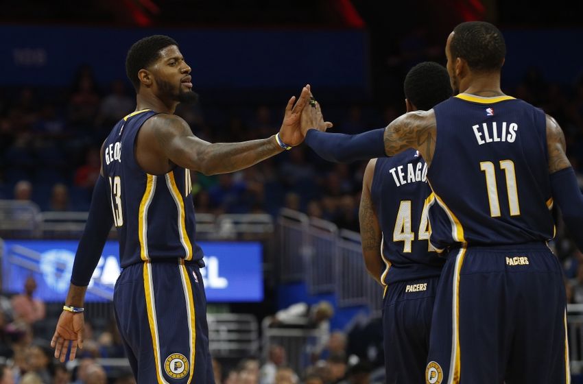 Oct 14, 2016; Orlando, FL, USA; Indiana Pacers forward Paul George (13) and guard Monta Ellis (11) high five against the Orlando Magic during the first quarter at Amway Center. Mandatory Credit: Kim Klement-USA TODAY Sports