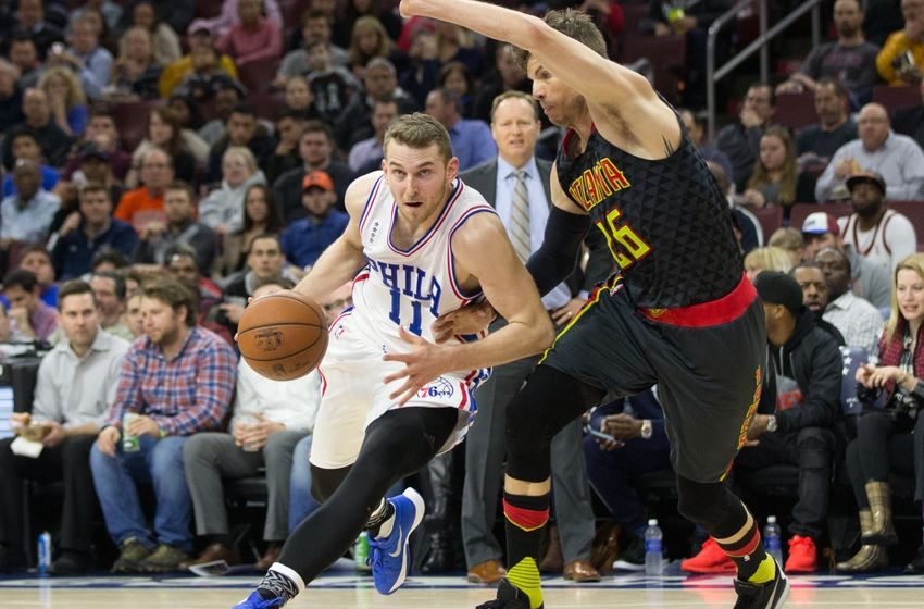 Feb 3, 2016; Philadelphia, PA, USA; Philadelphia 76ers guard Nik Stauskas (11) dribbles past Atlanta Hawks guard <a rel=