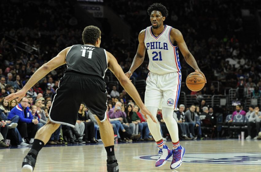 Dec 18, 2016; Philadelphia, PA, USA; Philadelphia 76ers center Joel Embiid (21) dribbles as Brooklyn Nets center <a rel=