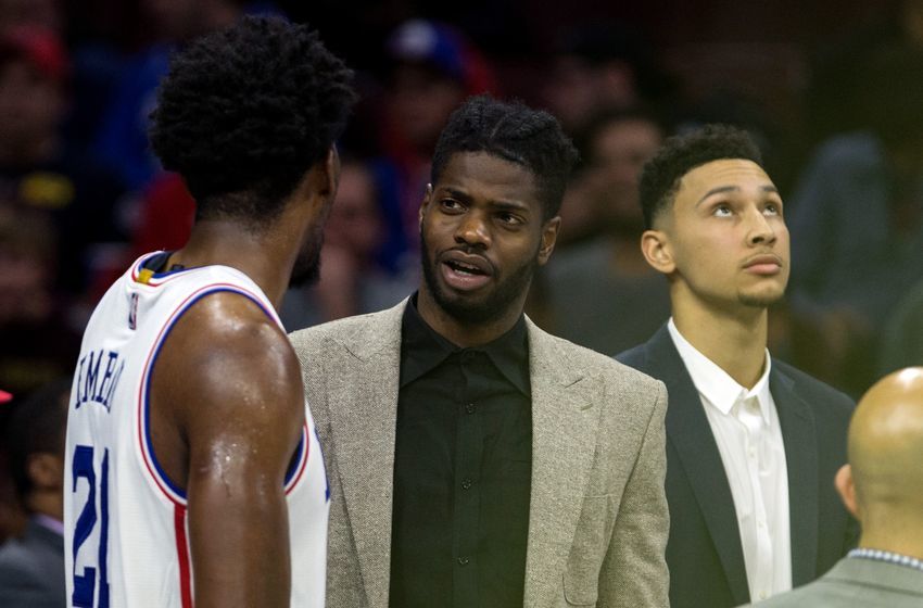 Dec 14, 2016; Philadelphia, PA, USA; Philadelphia 76ers center Joel Embiid (21) and forward Nerlens Noel (M) and forward <a rel=