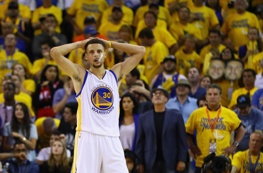 Video: Stephen Curry hits half court shot while sitting down Video: Stephen Curry hits half court shot while sitting down
