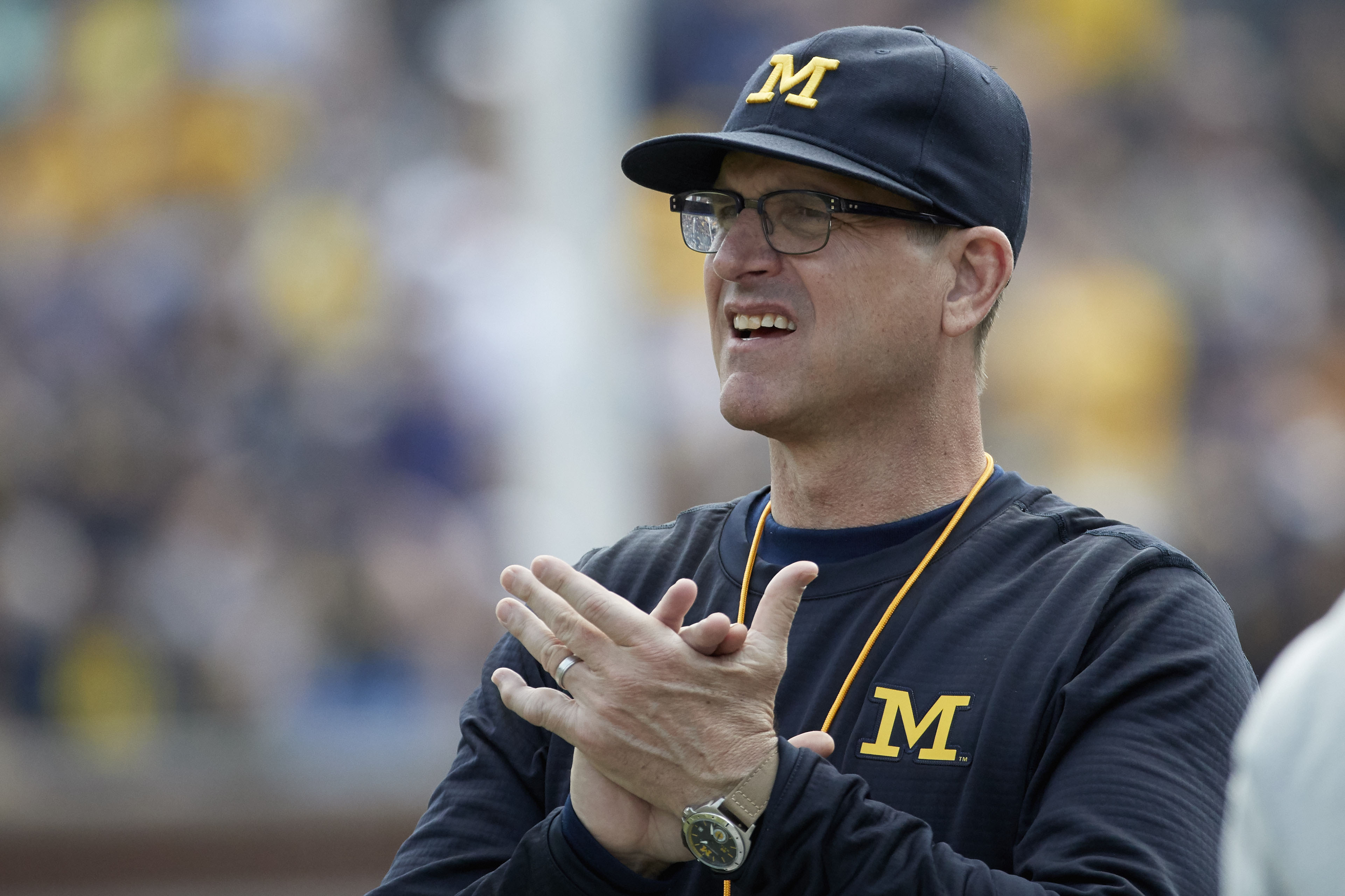 jim harbaugh past teams coached