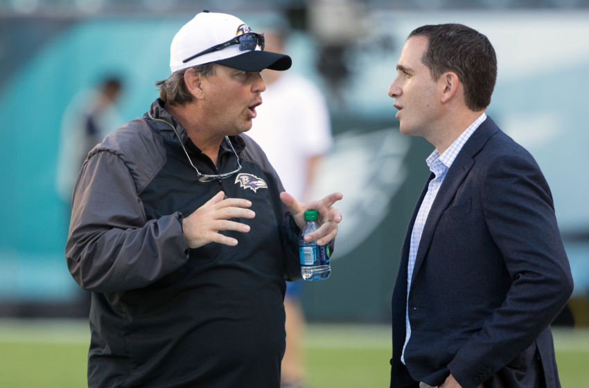 Aug 22, 2015; Philadelphia, PA, USA; Baltimore Ravens quarterback coach Marty Mornhinweg (left) talks with Philadelphia Eagles vice president of football operations Howie Roseman (right) during warm ups before a game at Lincoln Financial Field. Mandatory Credit: Bill Streicher-USA TODAY Sports