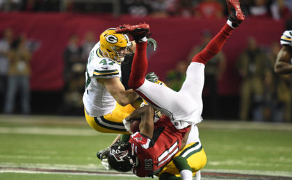 Jan 22, 2017; Atlanta, GA, USA; Atlanta Falcons wide receiver Julio Jones (11) makes a catch against Green Bay Packers inside linebacker <a rel=