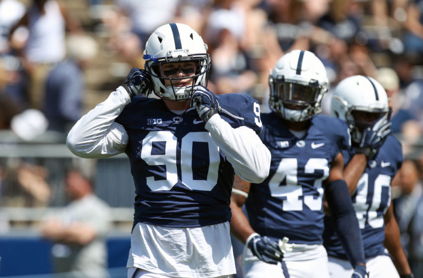 Apr 16, 2016; University Park, PA, USA; Penn State Nittany Lions defensive end Garrett Sickels (90) adjusts his helmet during a warmup prior to the Blue White spring game at Beaver Stadium. The Blue team defeated the White team 37-0. Mandatory Credit: Matthew O'Haren-USA TODAY Sports