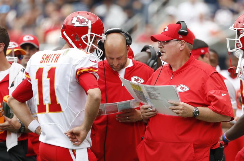 Aug 27, 2016; Chicago, IL, USA; Kansas City Chiefs quarterback Alex Smith (11) talks with head coach Andy Reid during a time out during the first half of the preseason game against the Chicago Bears at Soldier Field. Mandatory Credit: Kamil Krzaczynski-USA TODAY Sports